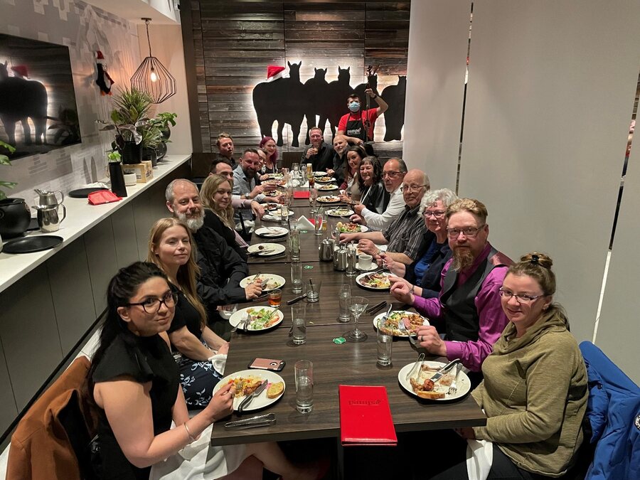 The Heinrich Designs team gathered for a celebratory dinner